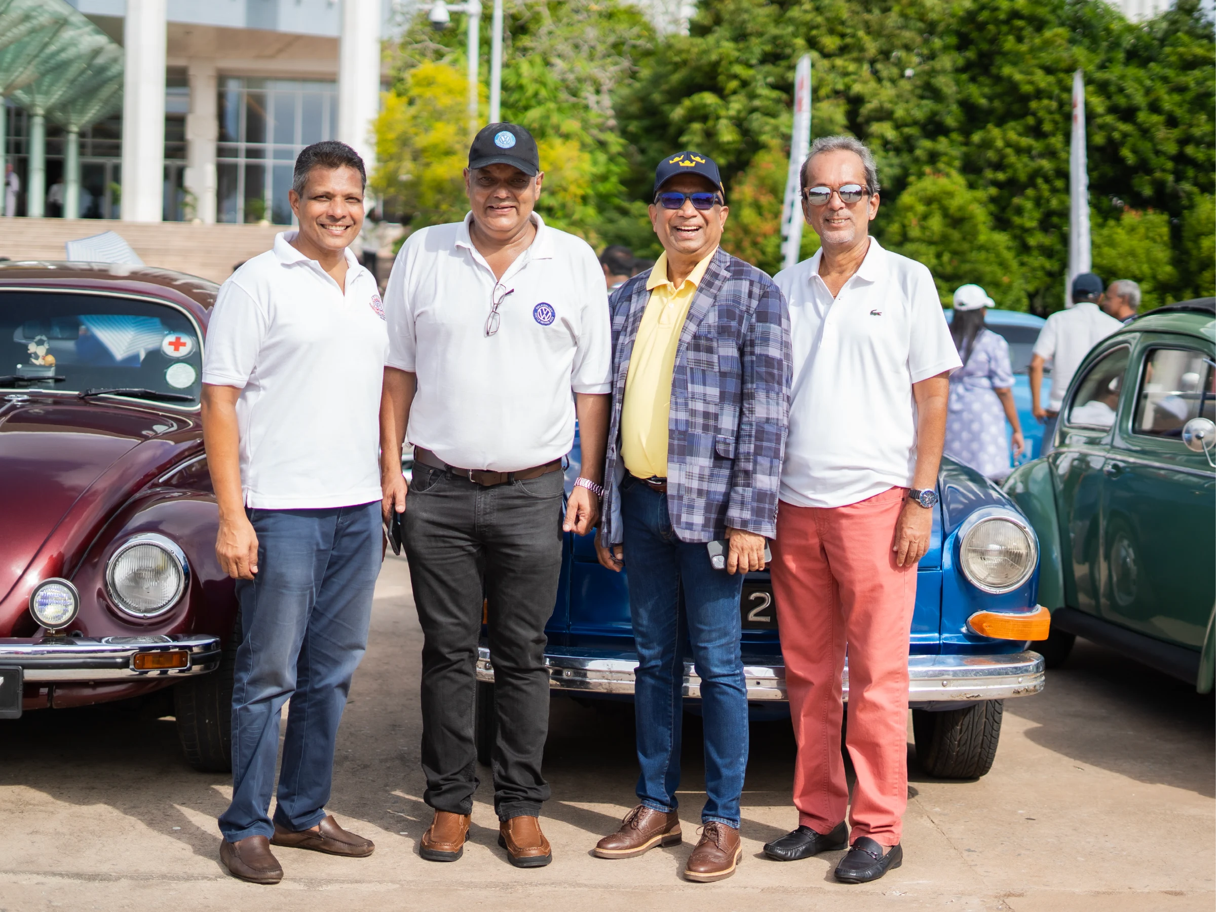 Guests photographed with classic Volkswagen cars at Mount Lavinia Hotel